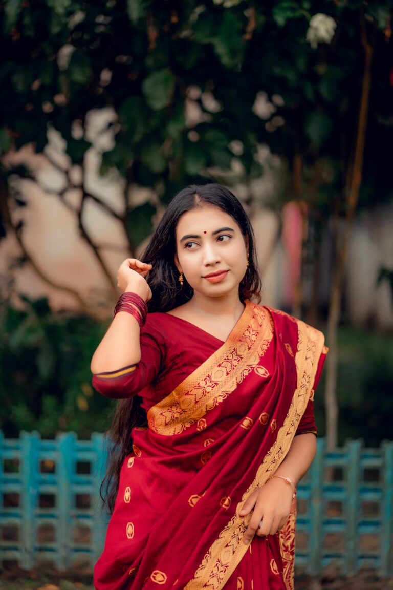 elegant portrait of woman in traditional bengali saree